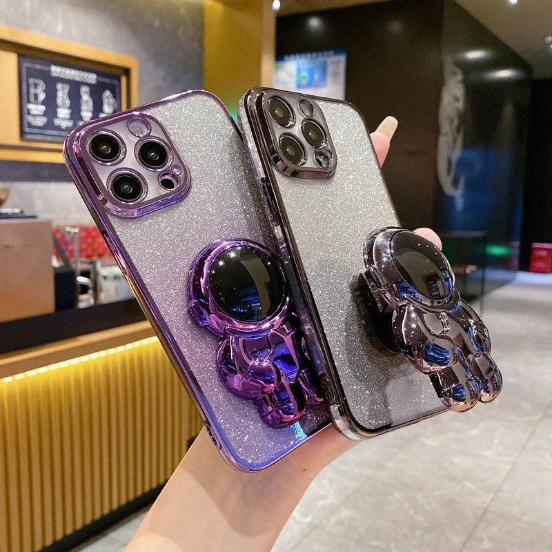 Luxus-Glitzer-Astronauten-Falt-Silikonhülle mit Ständer und Handhalterung für Apple iPhone 17/17 Air, 16/16e, 15, 14, 13 Pro Max Plus | Stoßfest, wasserabweisend & fingerabdruckfrei